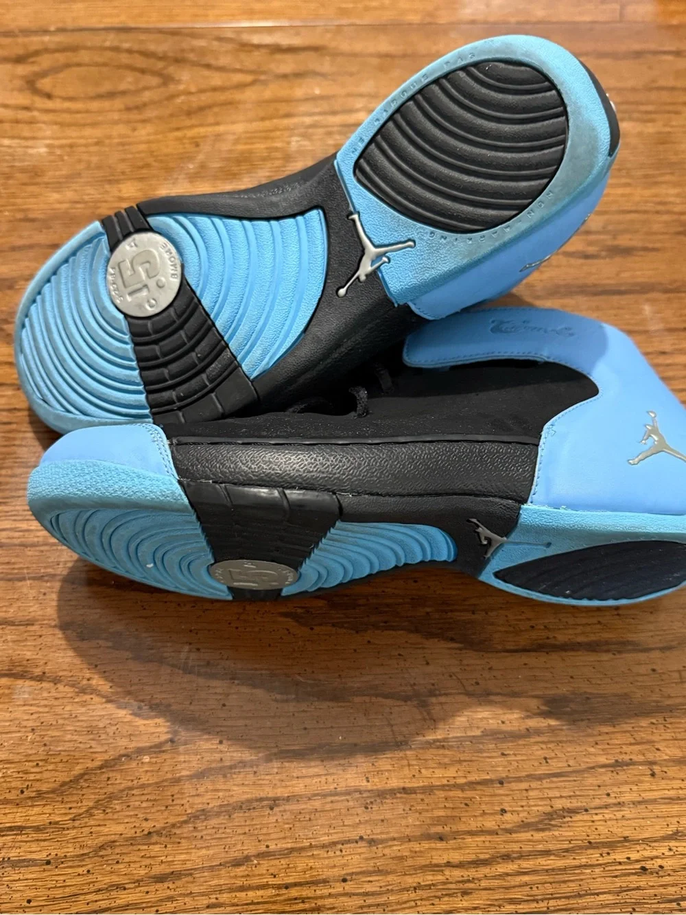 Kids Nike Melo 1.5 shoes black/university blue.